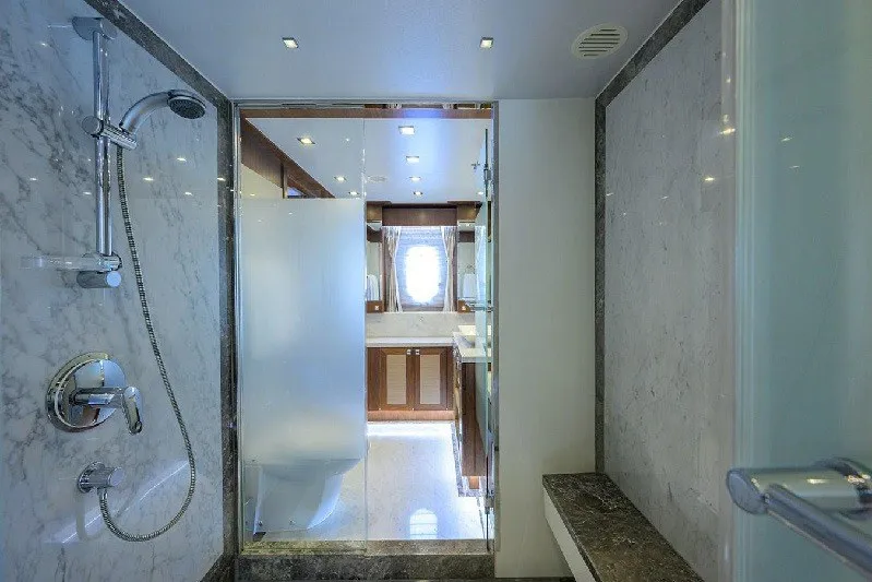 Slide: The Image of Luxurious bathroom in 2018 Hargrave Raised Pilothouse yacht with marble shower and modern fixtures. - 45