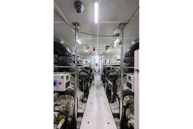 Slide: The Image of Engine room of 2018 Hargrave Raised Pilothouse yacht, featuring modern equipment and lighting. - 66