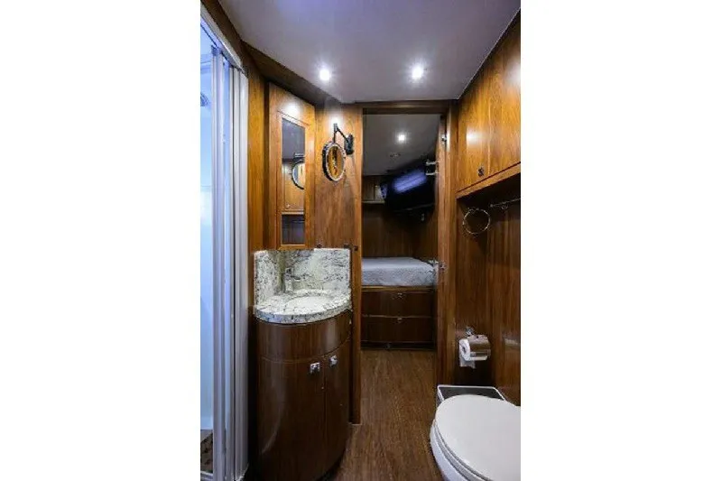 Slide: The Image of Luxurious 2018 Hargrave Raised Pilothouse yacht bathroom with wood accents and modern fixtures. - 59
