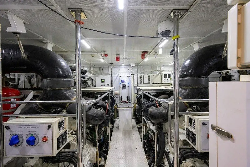 Slide: The Image of Engine room of 2018 Hargrave Raised Pilothouse yacht, featuring advanced machinery and controls. - 65