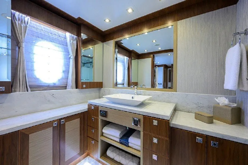 Slide: The Image of Luxurious bathroom in 2018 Hargrave Raised Pilothouse yacht with elegant wood and marble finishes. - 47