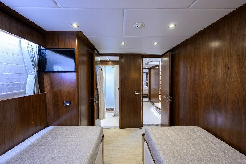 Slide: The Image of Luxurious 2018 Hargrave Raised Pilothouse yacht cabin with twin beds and wooden interior. - 49