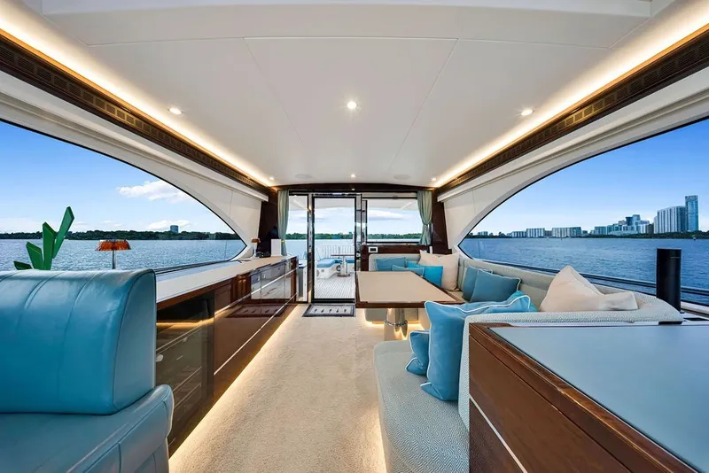 Slide: The Image of Luxurious interior of 2021 Steeler 60S yacht with panoramic water views and elegant furnishings. - 71
