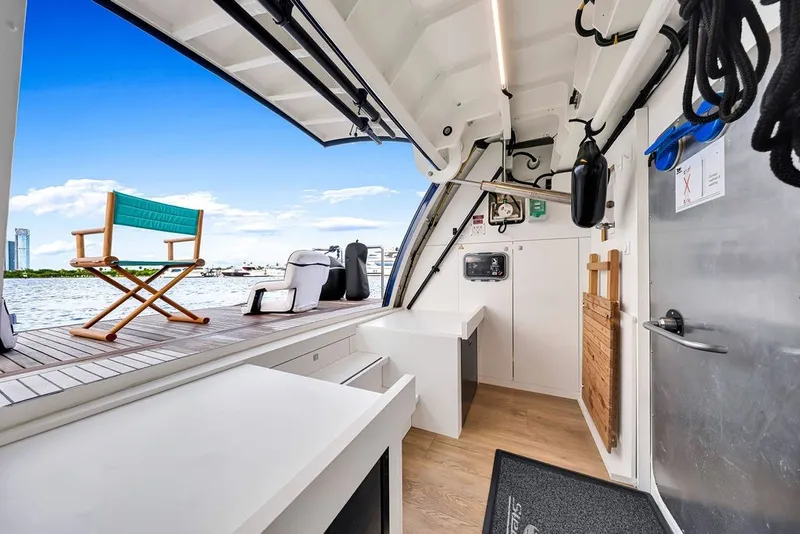 Slide: The Image of Interior view of 2021 Steeler 60S yacht with open deck and seating area. - 53