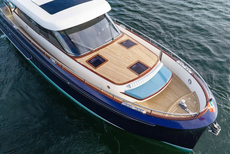 Slide: The Image of Luxurious 2021 Steeler 60S yacht with sleek design and spacious deck on open water. - 45