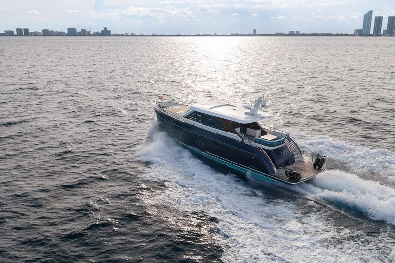 Slide: The Image of Luxury Steeler 60S yacht cruising on open water, 2021 model. - 22