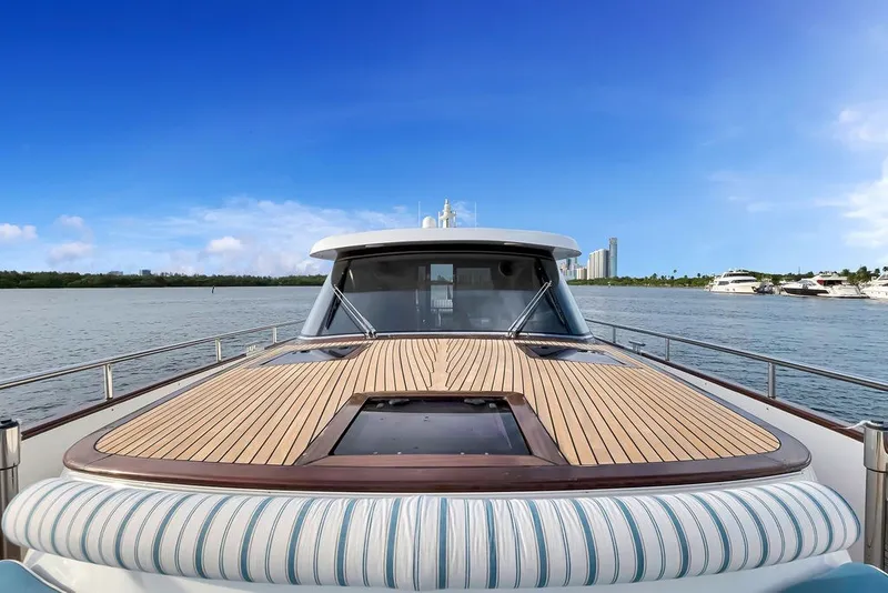 Slide: The Image of Luxurious 2021 Steeler 60S yacht with sleek deck design on tranquil water. - 63