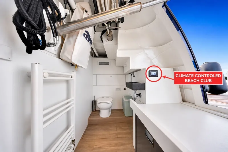 Slide: The Image of Luxurious Steeler 60S yacht interior with climate-controlled beach club, featuring modern amenities. - 51