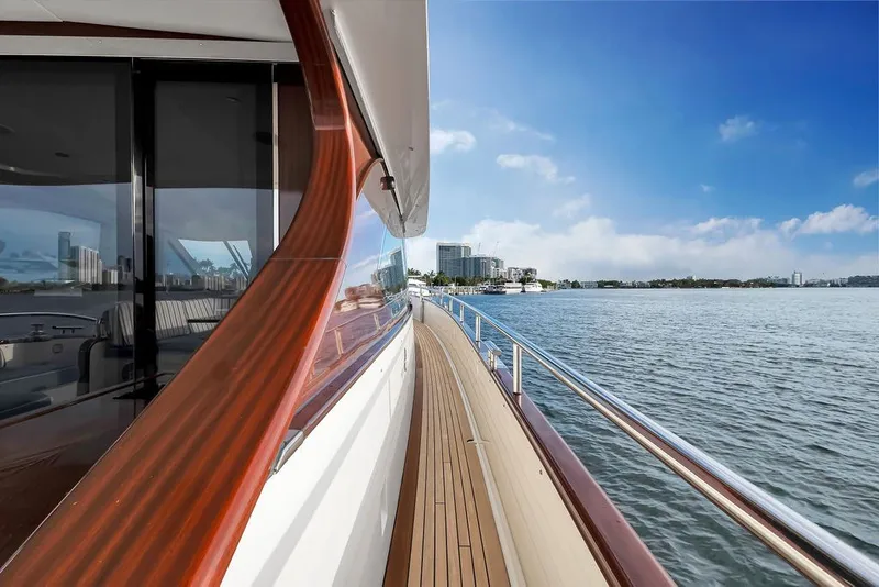 Slide: The Image of Luxurious 2021 Steeler 60S yacht deck with scenic waterfront view. - 61