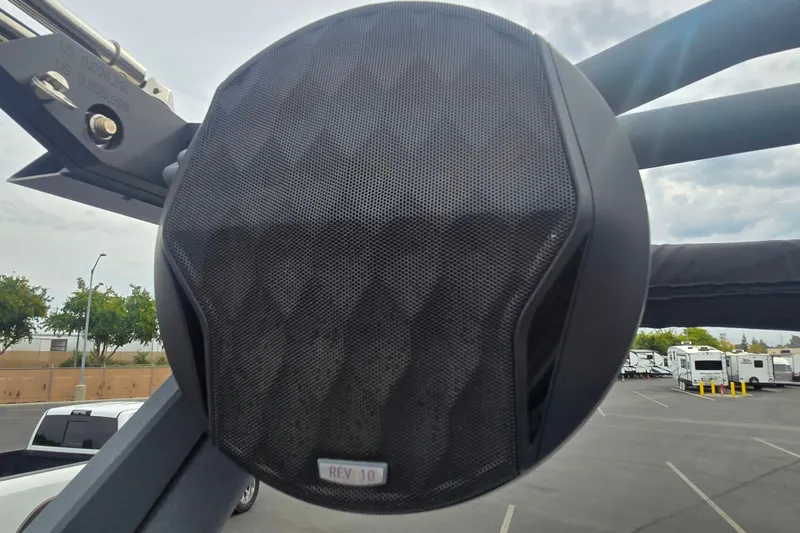 Slide: The Image of Close-up of a REV 10 speaker on a 2025 Malibu Wakesetter 23 LSV boat. - 17