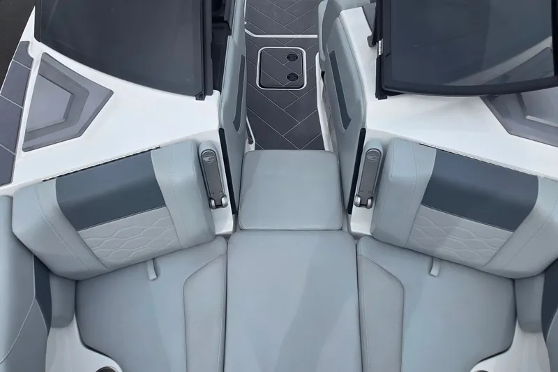 Slide: The Image of 2025 Malibu Wakesetter 23 LSV interior with sleek gray seating and modern design. - 19