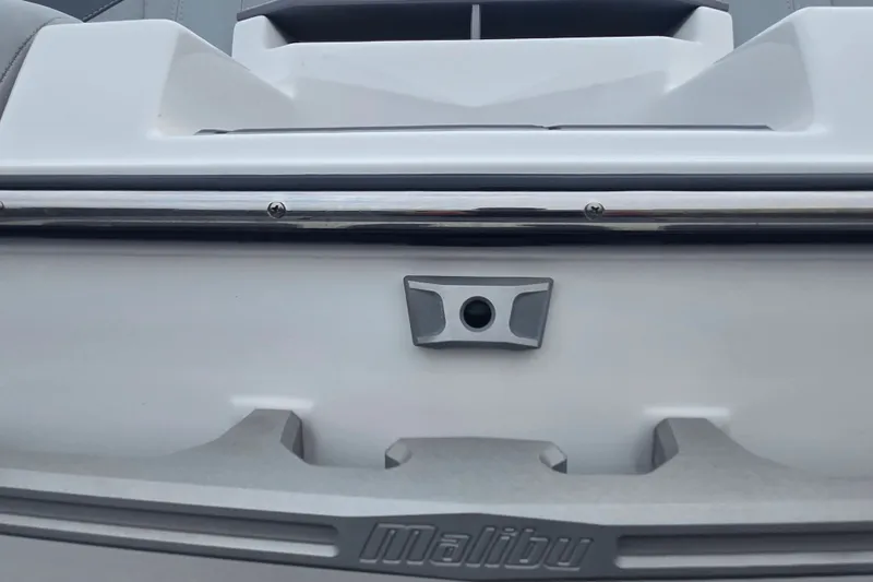 Slide: The Image of 2025 Malibu Wakesetter 23 LSV rear detail with sleek design and chrome accents. - 24