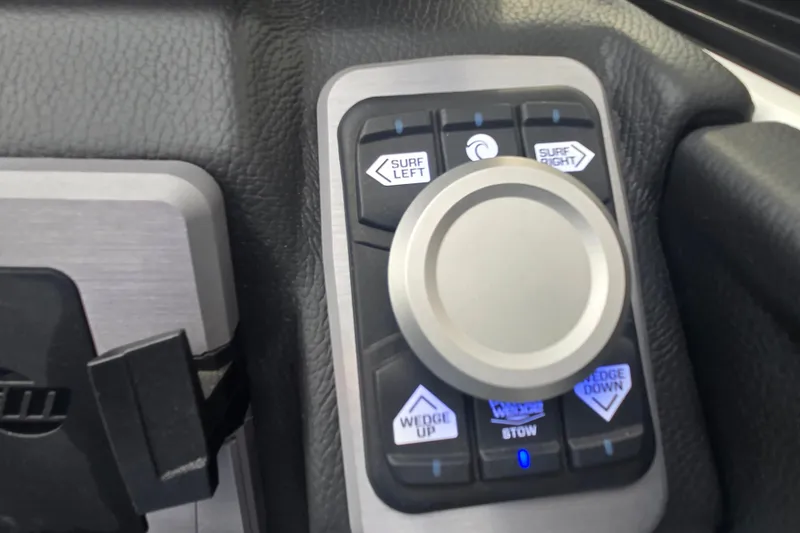 Slide: The Image of Control panel of 2025 Malibu Wakesetter 23 LSV with surf and wedge adjustments. - 14