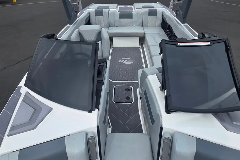 Slide: The Image of 2025 Malibu Wakesetter 23 LSV interior with sleek seating and modern design. - 18