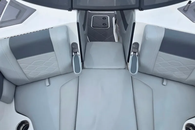 Slide: The Image of 2025 Malibu Wakesetter 23 LSV interior with sleek, modern seating design. - 20