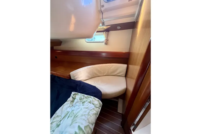 Slide: The Image of Interior cabin of 2007 Jeanneau Sun Odyssey 42 DS yacht with cozy seating. - 58
