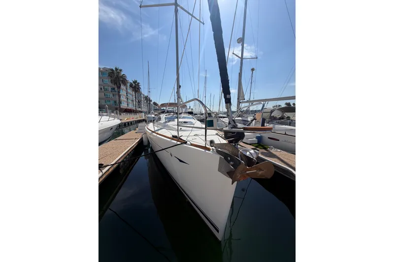 Slide: The Image of 2007 Jeanneau Sun Odyssey 42 DS sailboat docked in a sunny marina. - 20