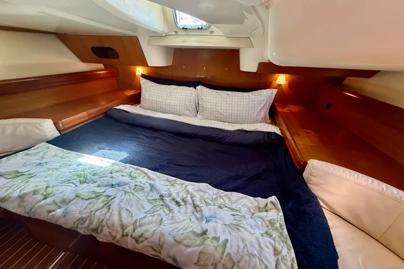 Slide: The Image of Luxurious cabin interior of 2007 Jeanneau Sun Odyssey 42 DS yacht with cozy bedding. - 54
