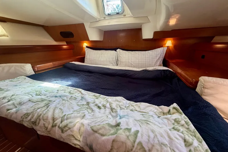 Slide: The Image of Luxurious cabin interior of 2007 Jeanneau Sun Odyssey 42 DS yacht with cozy bedding. - 55