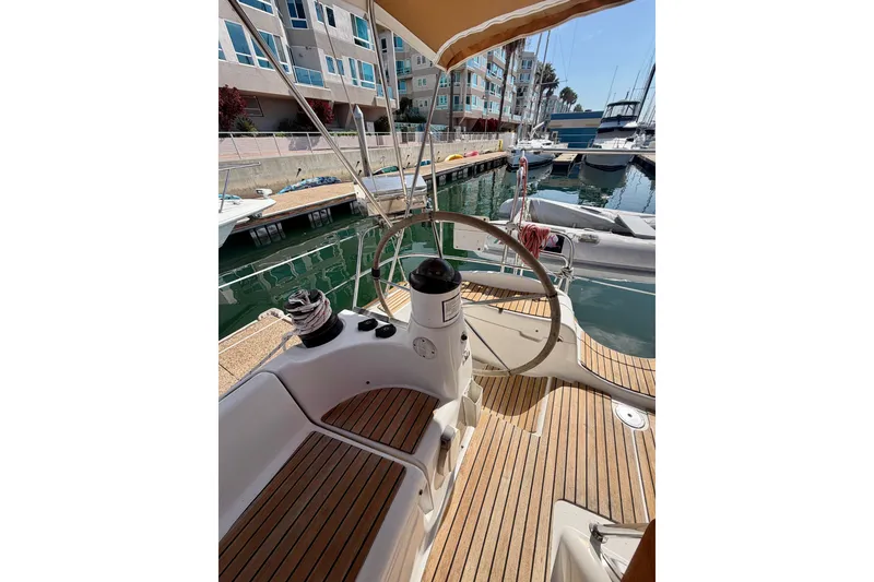 Slide: The Image of Cockpit view of 2007 Jeanneau Sun Odyssey 42 DS sailboat docked at marina. - 31