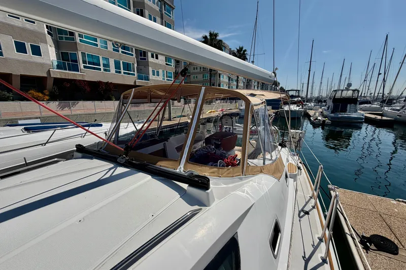Slide: The Image of 2007 Jeanneau Sun Odyssey 42 DS sailboat docked at marina, sunny day. - 12