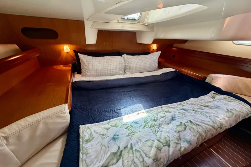 Slide: The Image of Luxurious cabin interior of 2007 Jeanneau Sun Odyssey 42 DS yacht with cozy bedding. - 56