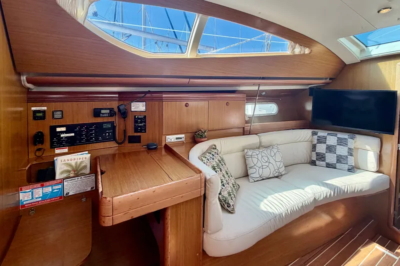 Slide: The Image of Interior of 2007 Jeanneau Sun Odyssey 42 DS yacht with cozy seating and navigation station. - 85