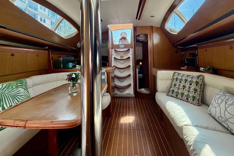Slide: The Image of Luxurious interior of 2007 Jeanneau Sun Odyssey 42 DS sailboat with elegant wood finish. - 49