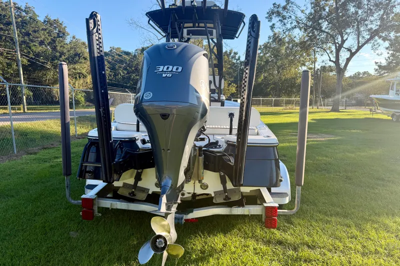 Slide: The Image of Rear view of 2012 BlackJack 224 boat with powerful outboard motor. - 12