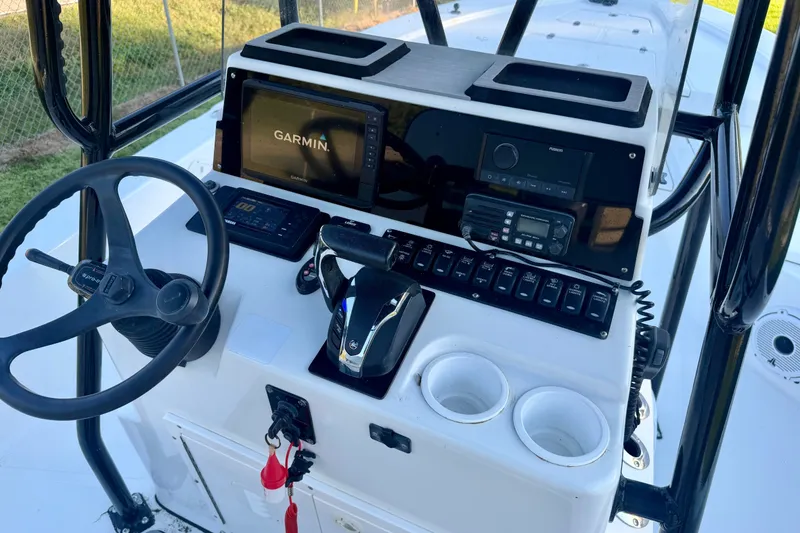 Slide: The Image of Center console of 2012 BlackJack 224 boat with Garmin navigation system. - 5