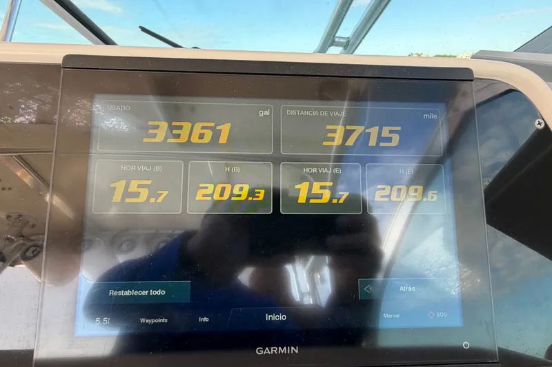 Slide: The Image of Garmin display on 2005 Wellcraft 290 Coastal showing fuel usage and travel distance. - 31