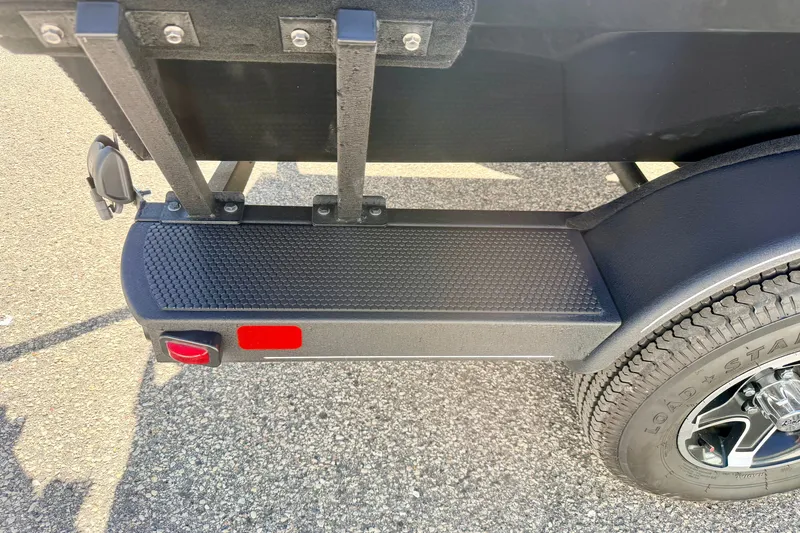 Slide: The Image of 2023 Ranger VS1665T trailer step with textured surface and rear light. - 73