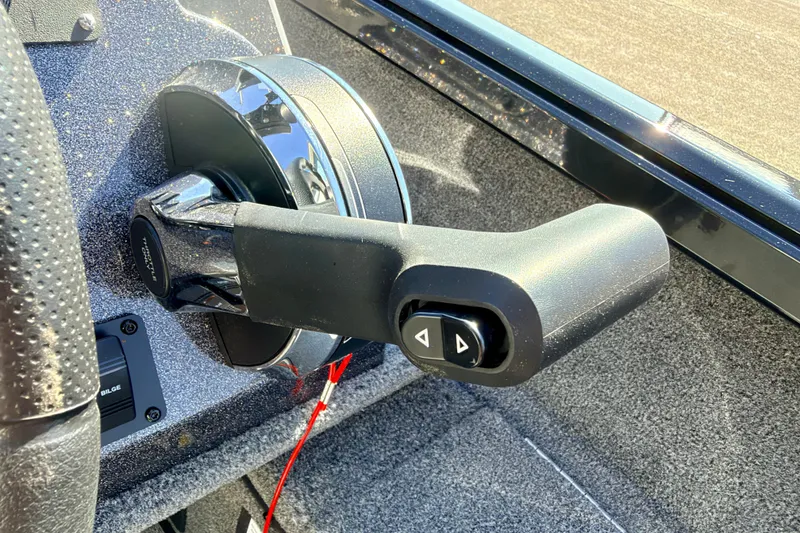Slide: The Image of Throttle control lever on a 2023 Ranger VS1665T boat, featuring ergonomic design and control buttons. - 43