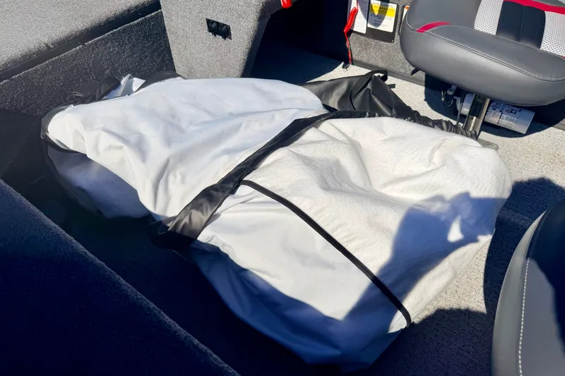 Slide: The Image of 2023 Ranger VS1665T interior with white bag on carpeted floor. - 67