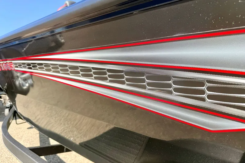 Slide: The Image of 2023 Ranger VS1665T boat with sleek red and silver detailing. - 8