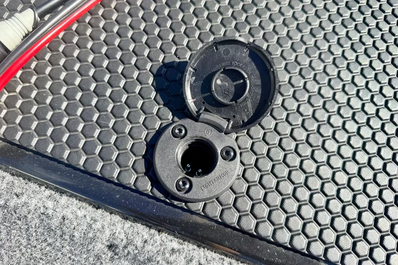 Slide: The Image of Open hatch on hexagonal-patterned surface of 2023 Ranger VS1665T boat. - 62