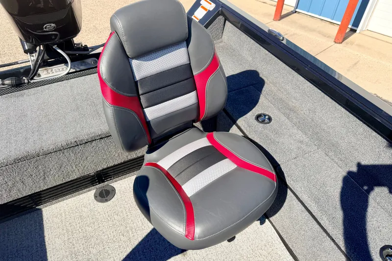 Slide: The Image of 2023 Ranger VS1665T boat seat with gray, red, and black design. - 32