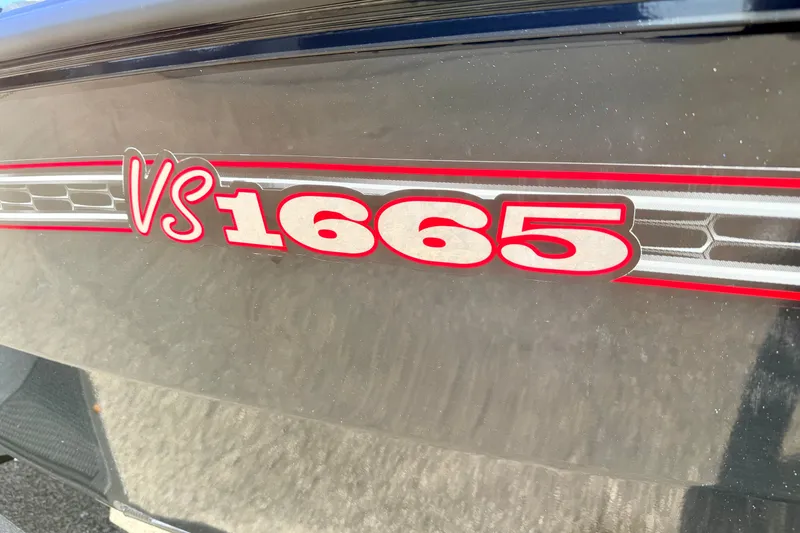 Slide: The Image of 2023 Ranger VS1665T boat model logo in bold red lettering. - 16