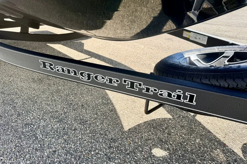 Slide: The Image of Trailer of 2023 Ranger VS1665T with "Ranger Trail" branding on pavement. - 75