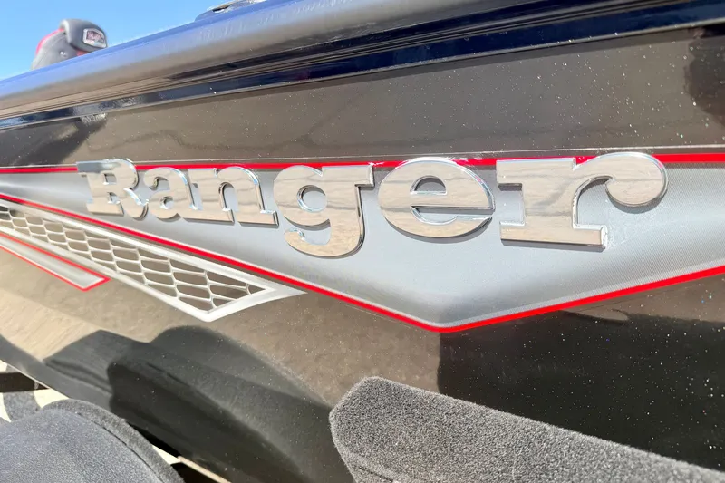 Slide: The Image of 2023 Ranger VS1665T boat logo with sleek design and metallic finish. - 7