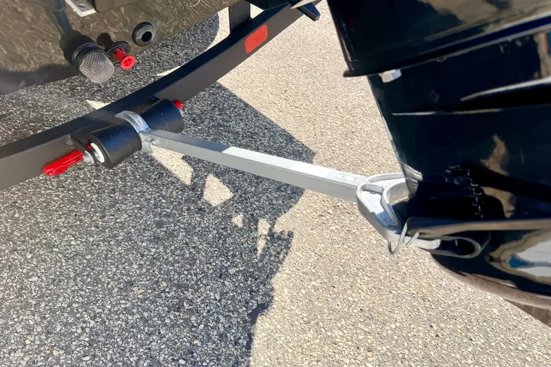 Slide: The Image of Trailer hitch connection on a 2023 Ranger VS1665T boat, parked on asphalt. - 66