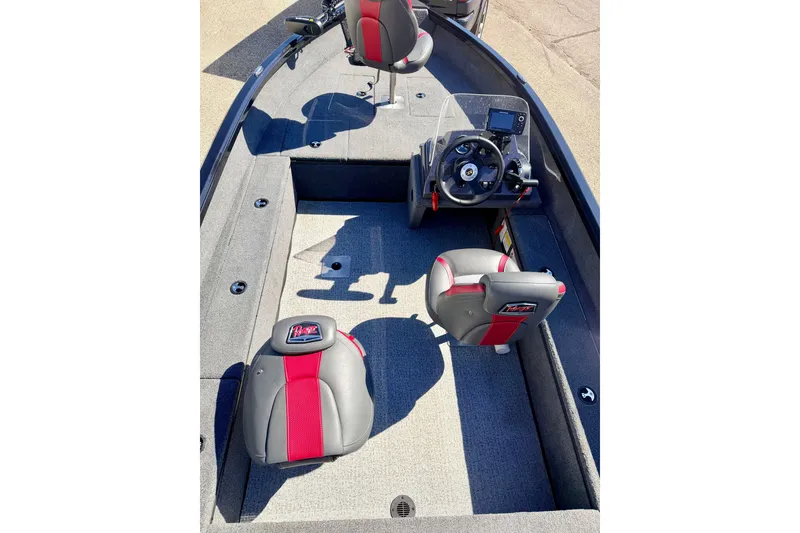 Slide: The Image of 2023 Ranger VS1665T boat interior with steering wheel and seating. - 25