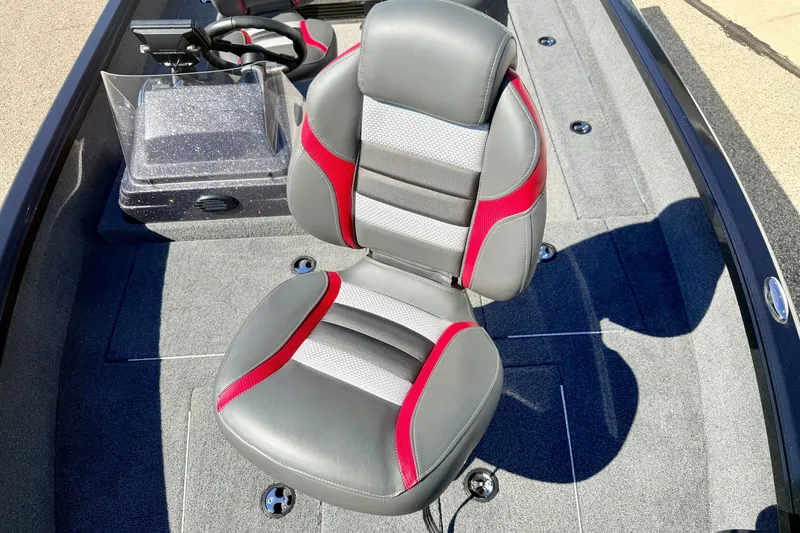 Slide: The Image of 2023 Ranger VS1665T boat seat with gray, red, and white design on deck. - 52