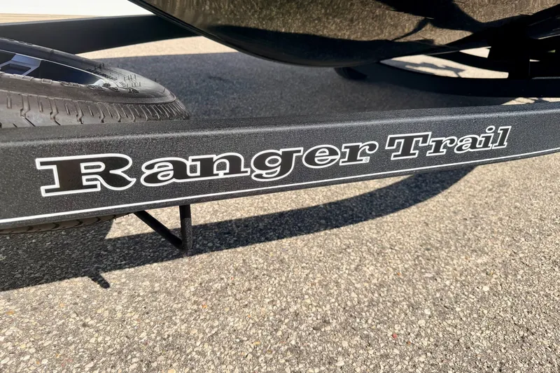 Slide: The Image of 2023 Ranger VS1665T trailer with 'Ranger Trail' branding on asphalt surface. - 70