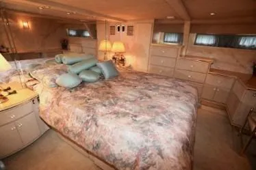 Slide: The Image of Luxurious 1989 custom bedroom with plush bedding, soft lighting, and elegant decor. - 33