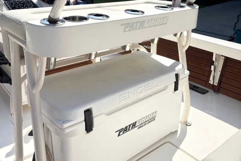 Slide: The Image of 2016 Pathfinder 2300 HPS boat interior with Engel cooler and rod holders. - 19