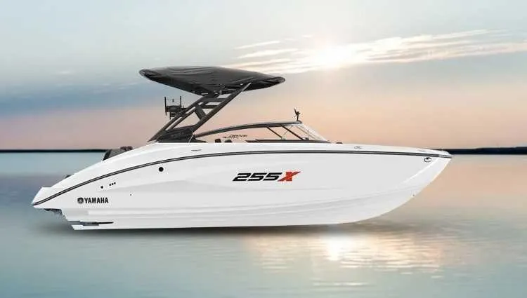 The Image of A sleek, modern Yamaha Jet 255XD boat on calm water at sunset. - 1
