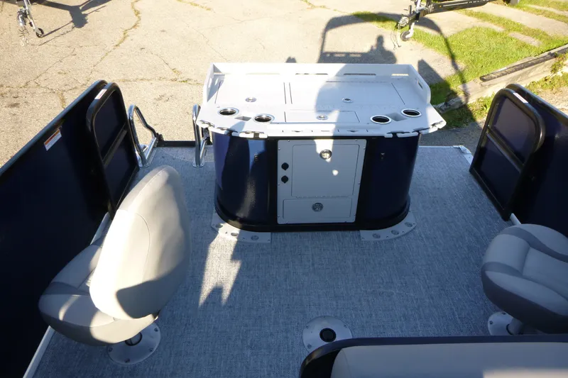 Slide: The Image of 2027 Premier 210 Sunsation Angler 4PT - CL boat interior with seating and storage. - 19