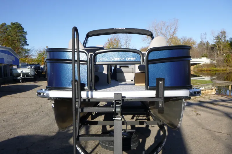 Slide: The Image of 2027 Premier 210 Sunsation Angler 4PT - CL pontoon boat on trailer, rear view. - 10