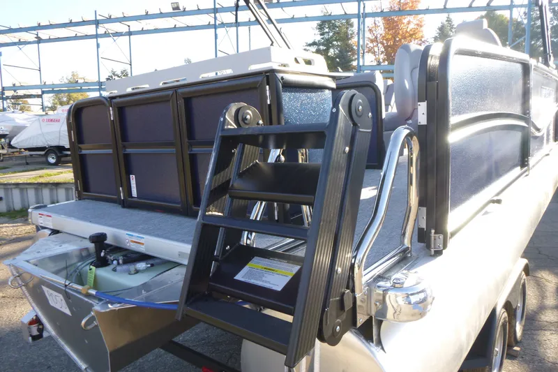 Slide: The Image of 2027 Premier 210 Sunsation Angler 4PT - CL pontoon boat with rear boarding ladder. - 6